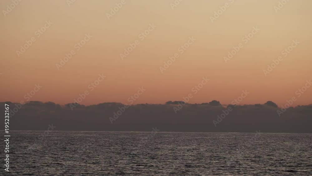 Sky after sunset over sea water surface, Greece Peloponnese Sky after sunset over sea water surface, Greece Peloponnese