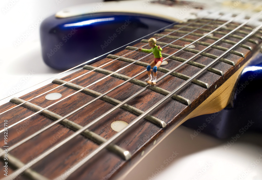 Fototapeta premium Miniature Skaters Guitar