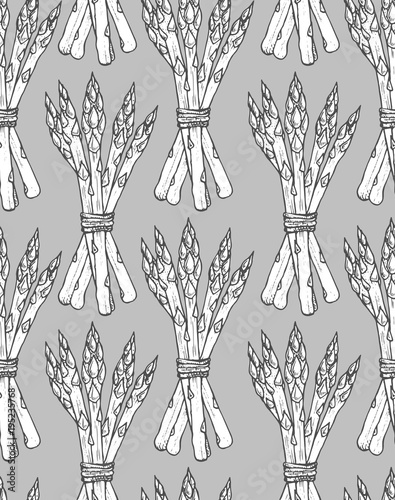 Seamless pattern with sketch style asparagus bunch.  Vegetarian background elements
