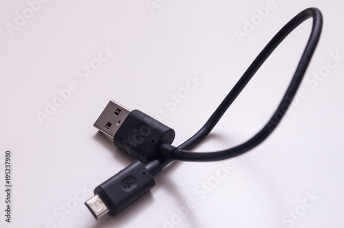 Micro-USB cable connector on white background.
