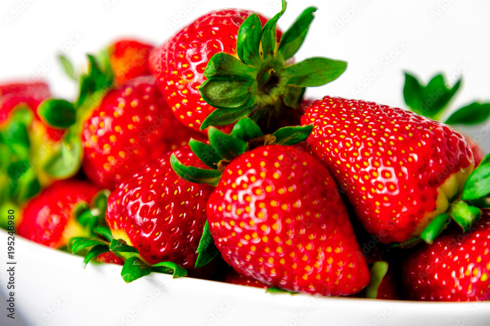 strawberry on white bowl with white background strawberry on white bowl with white background