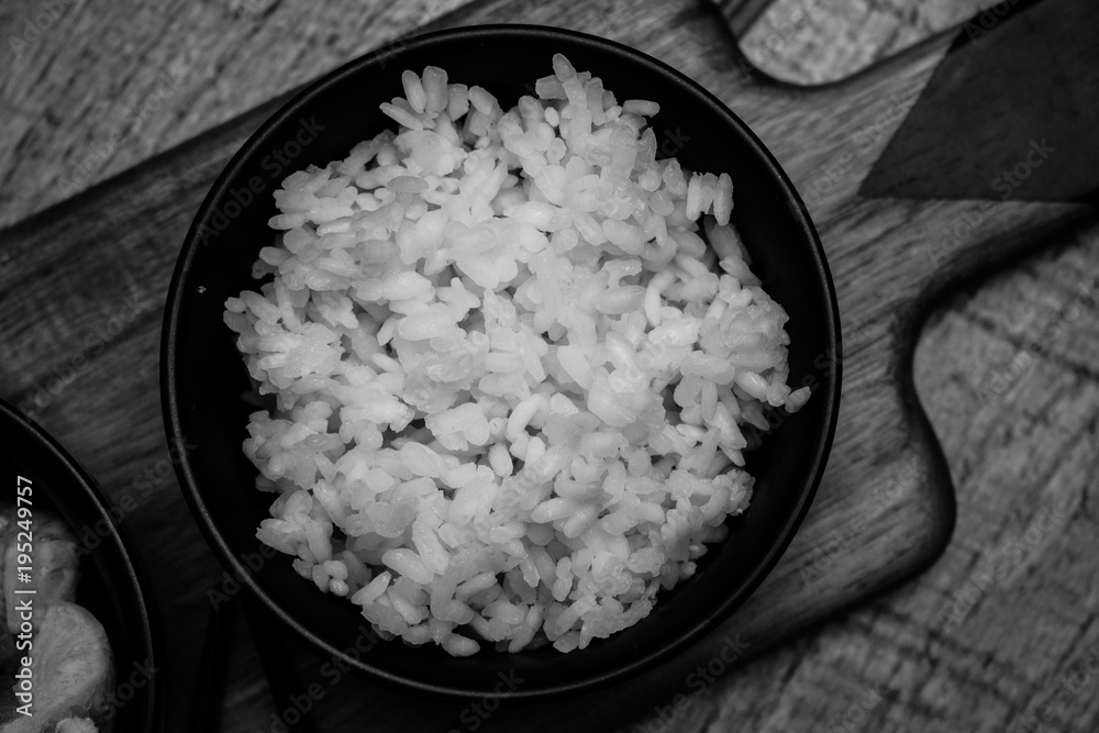 Chinese rice bowl on wood or wooden background Chinese rice bowl on wood or wooden background