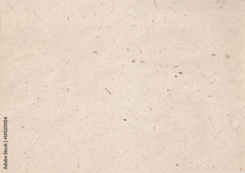 texture of kraft paper sheet with dark brown grain shavings texture of kraft paper sheet with dark brown grain shavings