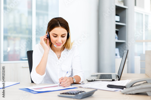 Businesswoman working at call center