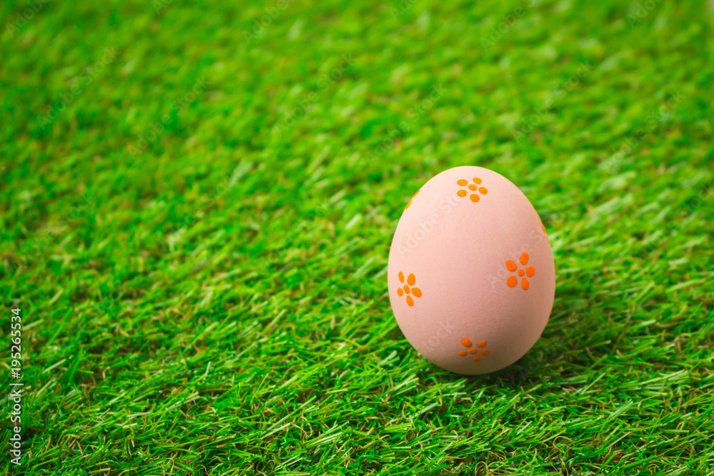 Easter eggs on the green grass.
