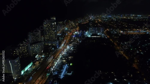 Wallpaper Mural Miami Beach city lights at night boat show lateral flight Torontodigital.ca