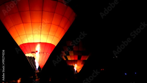Hot air balloons light up at night