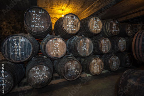Tableau sur toile Port wine barrels in cellar, Vila Nova de Gaia, Porto, Portugal