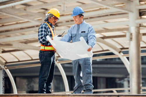 Engineer meeting,discussion with construction blueprint on site work,Business man meeting