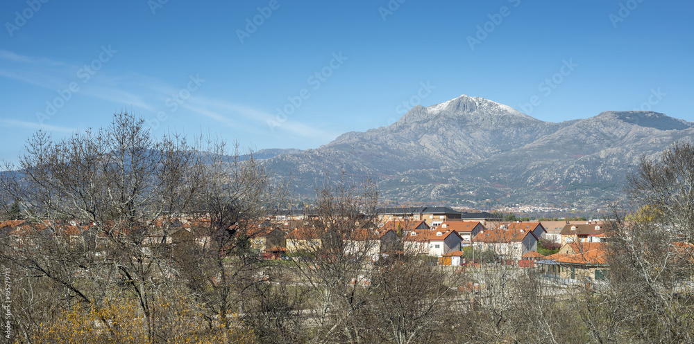 Views of the city of Cerceda, in the province of Madrid, Spain. In the background it can be seen The Maliciosa Peak, with 2.227 m.