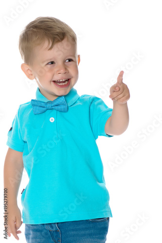 Little boy is showing a finger