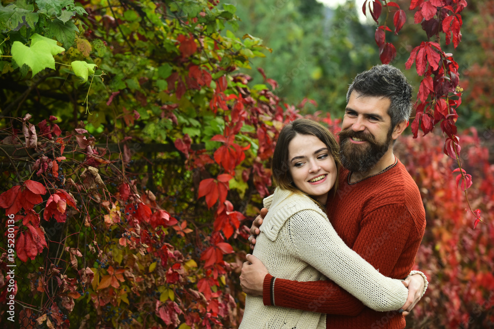 Couple with smiling faces cuddle each other with tenderness. Couple with smiling faces cuddle each other with tenderness.
