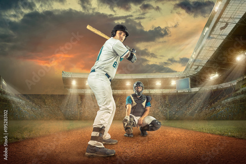 Baseball players in action on the stadium. © Andrii IURLOV