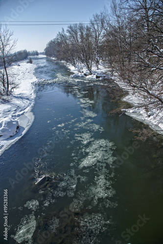 Winter landscape on the river © paulmalaianu