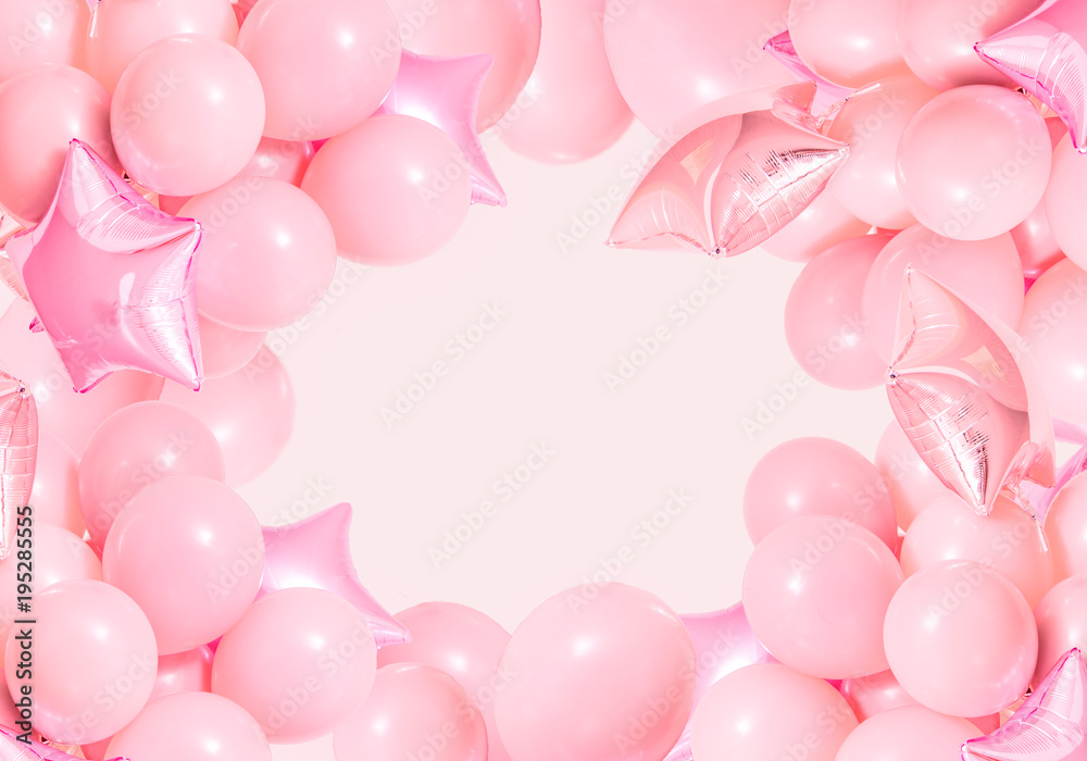 Pink birthday air balloons on mint background