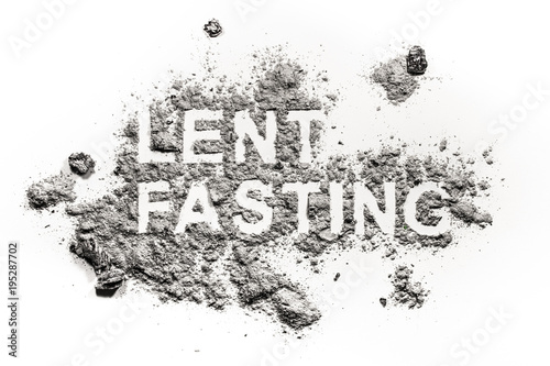 Lent fasting word written in ash, sand or dust