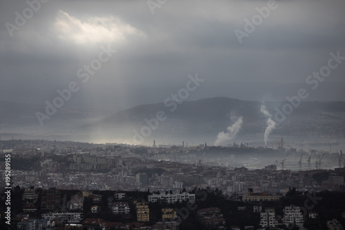 Moody and misty morning city and sea landscape in Trieste  Italy 