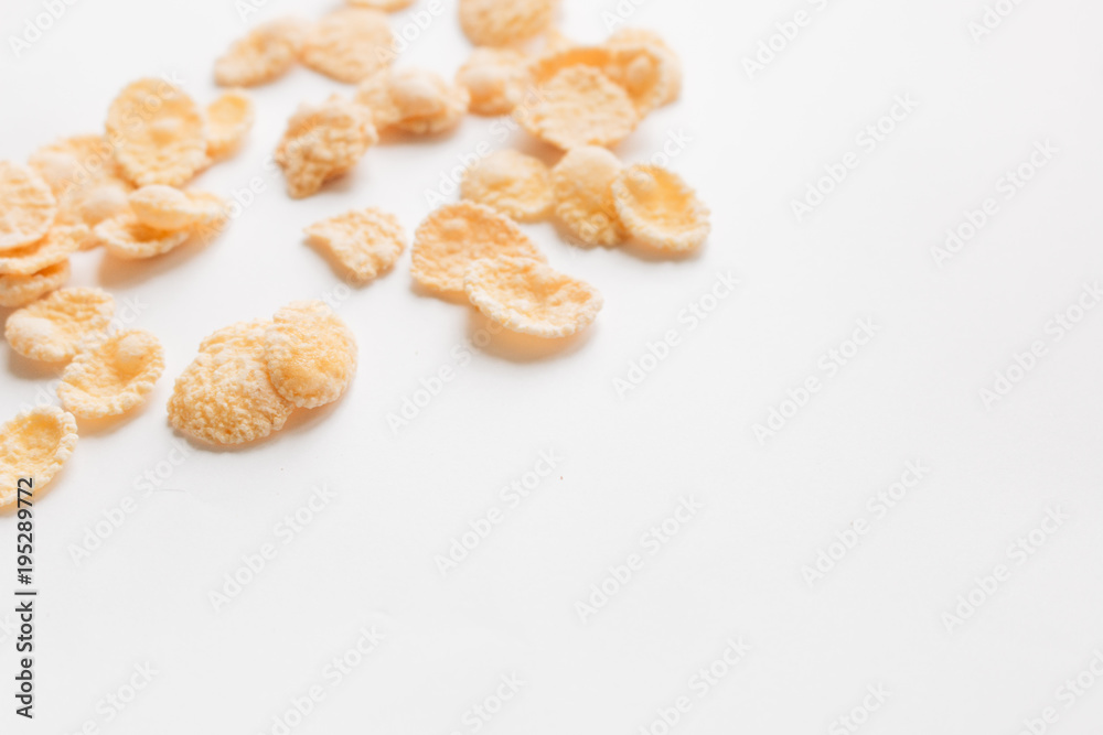 Round frame of delicious crispy cornflakes on white background, healthy breakfast