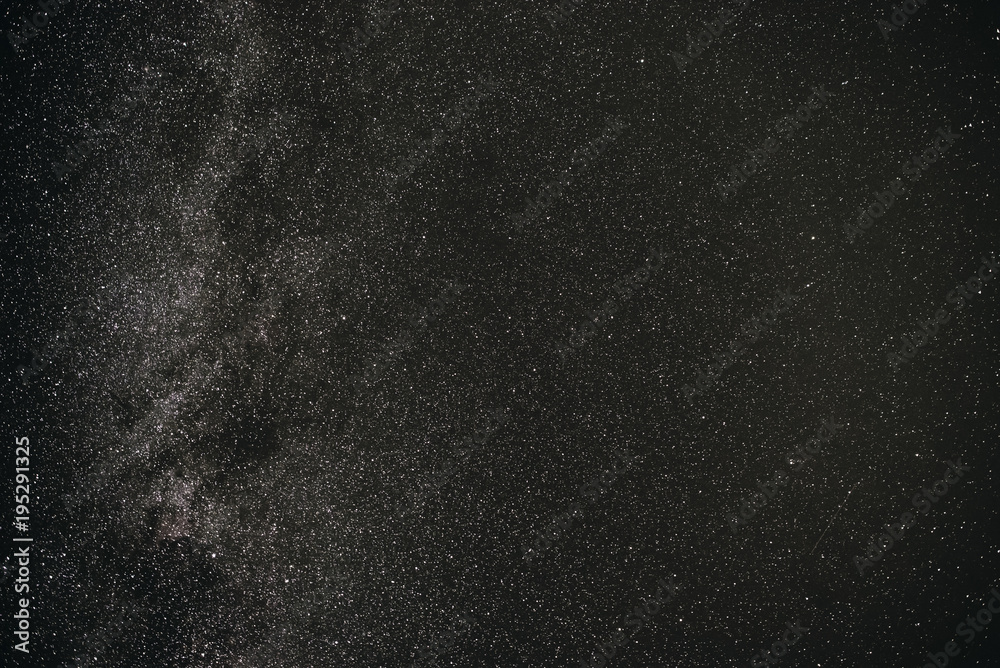 Background of gray starry night sky with the Milky Way