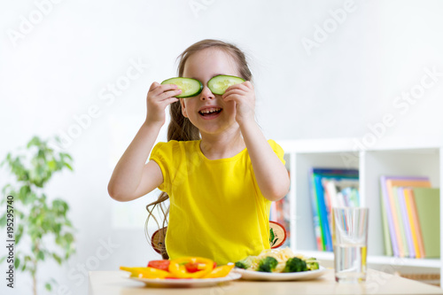 Happy little girl having fu...