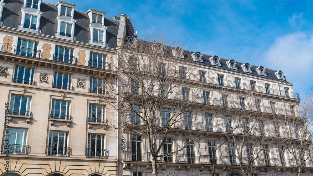 Paris, beautiful building in the center, typical parisian facade

