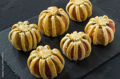 Apples stuffed with chicken liver and cheese in puff pastry