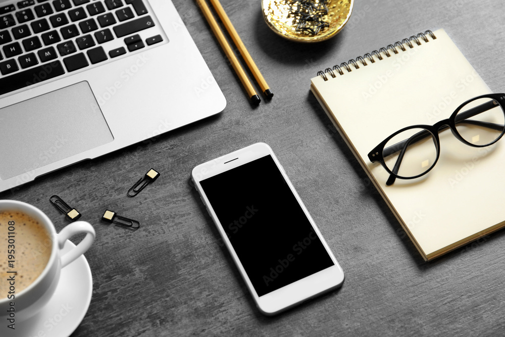 Set of devices and stationery on grey background. Mockup for design Set of devices and stationery on grey background. Mockup for design