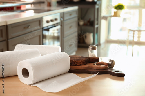Rolls of paper towels on ki...