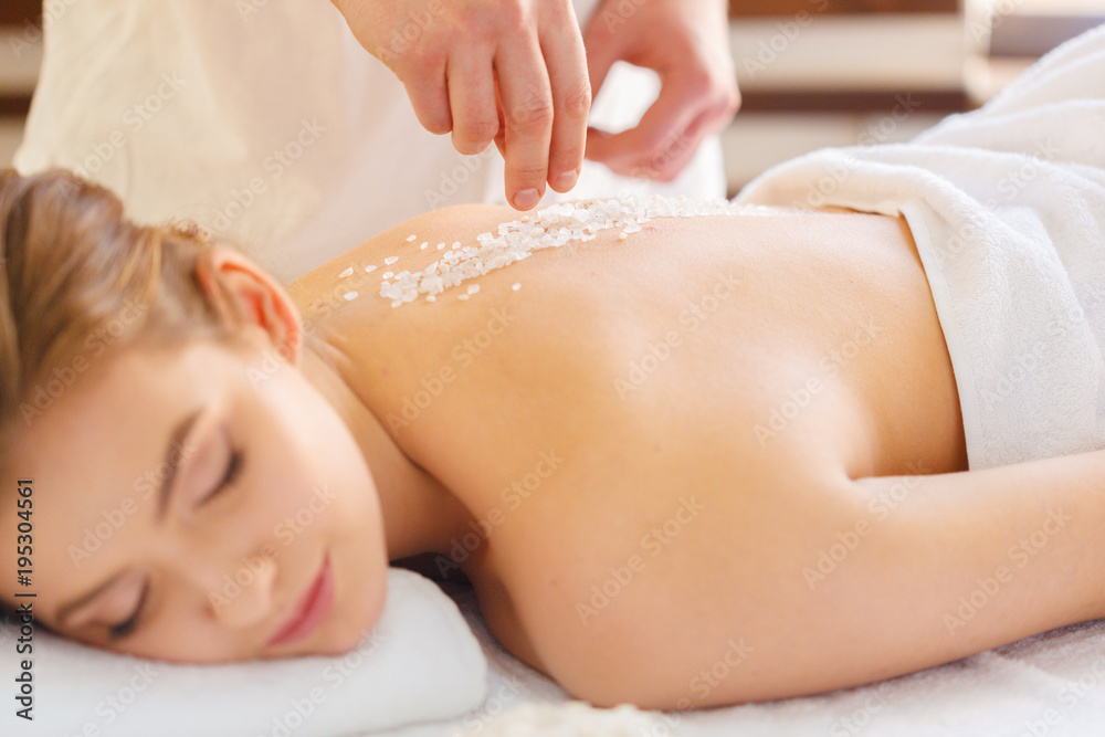 Beautiful, young and healthy woman in spa salon. Massage treatment Beautiful, young and healthy woman in spa salon. Massage treatment