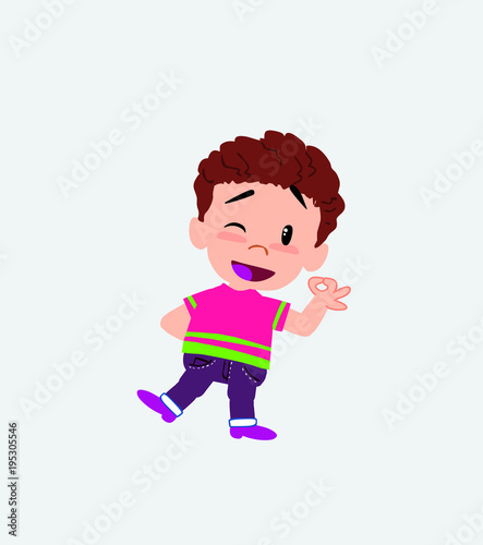 Boy in shirt doing the OK sign with his hand.