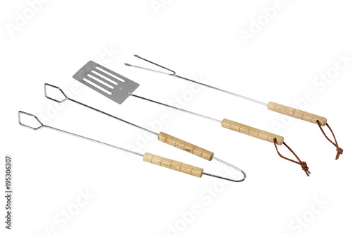 wooden handle on a white background tongs, fork and spatula