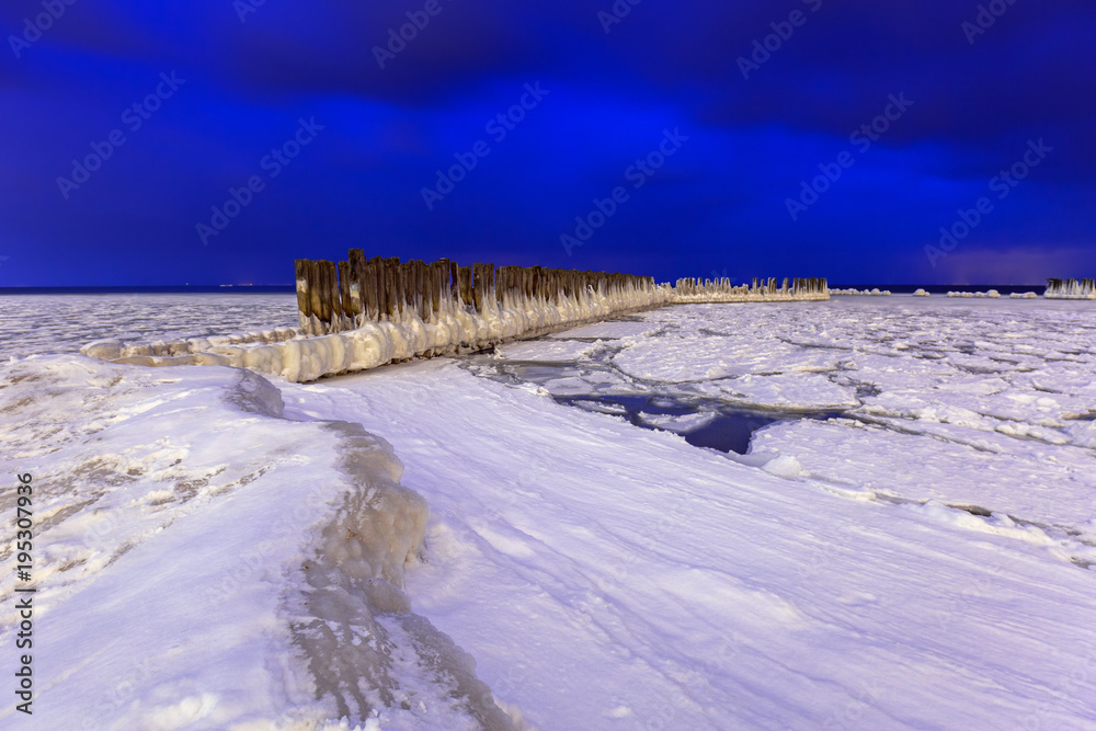 Frozen coastline of Baltic Sea in Gdynia at night, Poland Frozen coastline of Baltic Sea in Gdynia at night, Poland