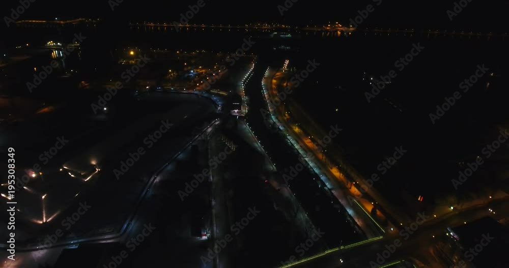 AERIAL. Klaipeda City lights. Night flight over the town center from bird eye. Winter time. AERIAL. Klaipeda City lights. Night flight over the town center from bird eye. Winter time.