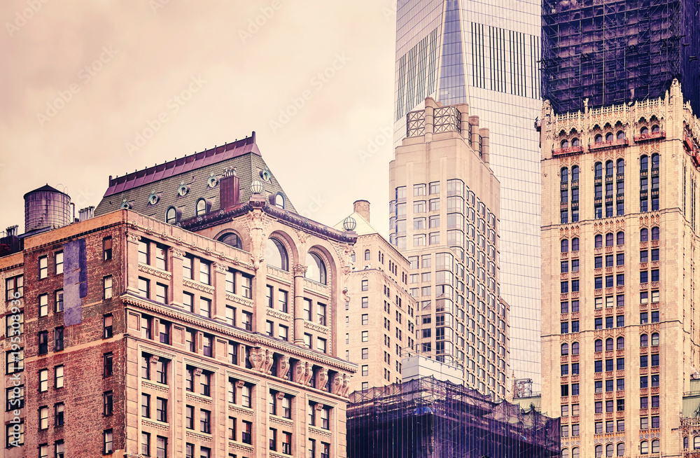 Retro stylized picture of old and modern buildings in New York City, USA.