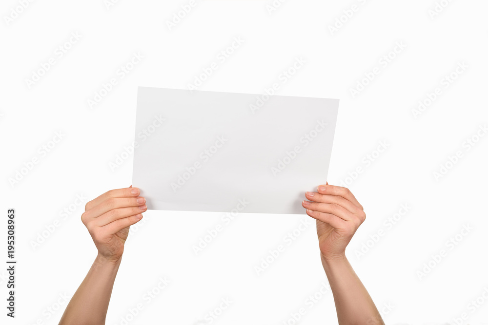 Cropped image of woman holding empty paper isolated on white Cropped image of woman holding empty paper isolated on white