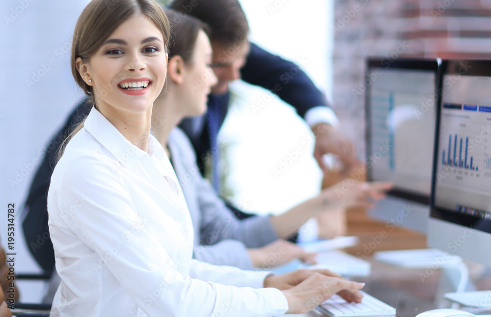 young professional and business team discussing financial data.