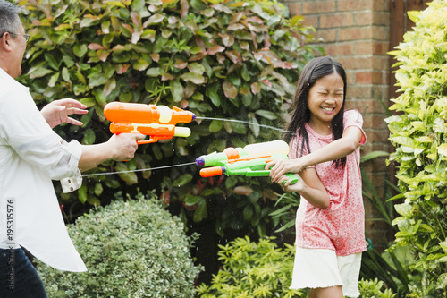 Losing at a Water Fight with Dad photo