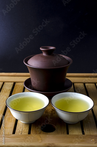 gaiwan for Chinese tea ceremony and two cups of tea