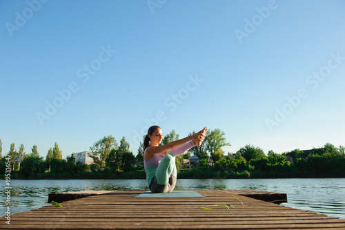 Woman Yoga Exercises Outdoor