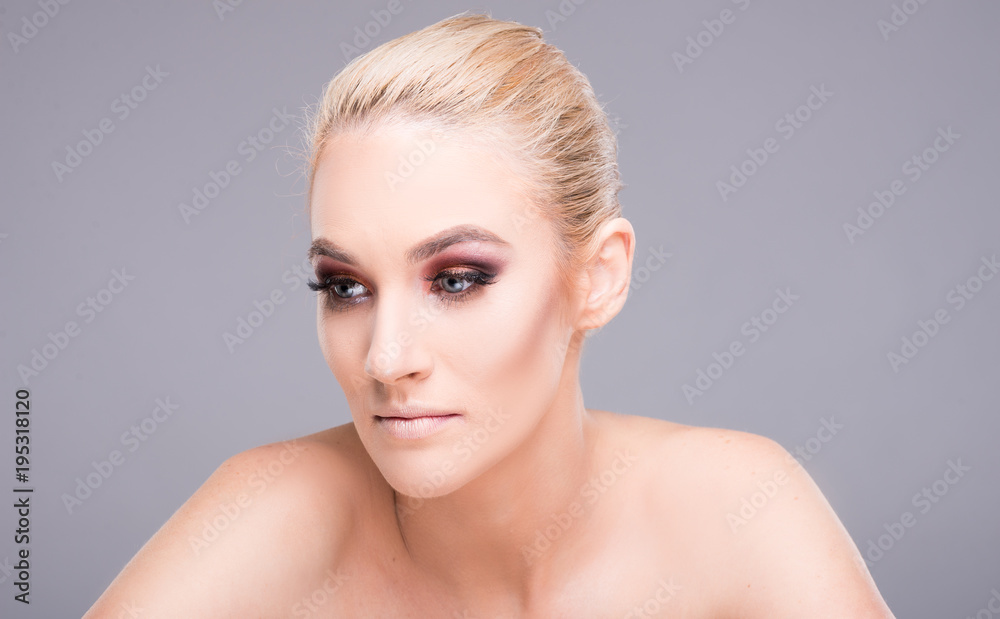 Beautiful young model posing wearing professional make-up. Beautiful young model posing wearing professional make-up.