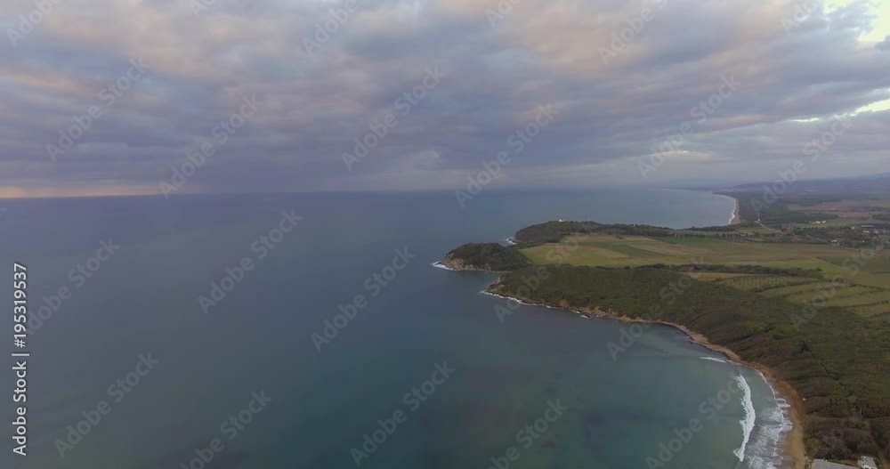Aerial, beautiful sea waves by the beach on a cloudy evening Aerial, beautiful sea waves by the beach on a cloudy evening