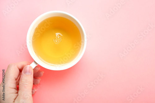 A cup with green tea
