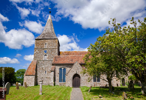 The church of St Mary the Virgin in St Mary in the Marsh, a village near New Romney in Kent, South East England, UK photo