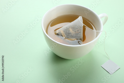 Mint tea bag in a cup