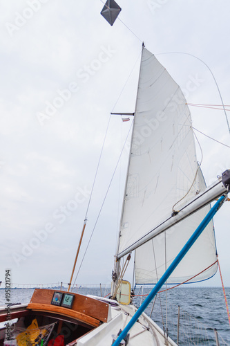 Seascape from sailing boat, milky foggy weather