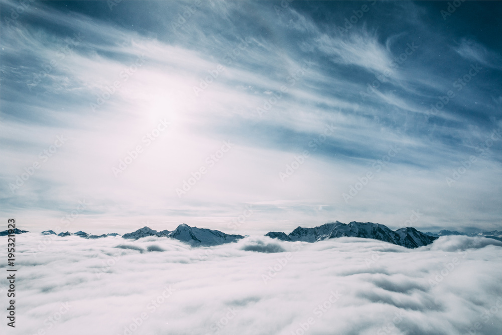 beautiful snow-covered mountain peaks and clouds, mayrhofen, austria beautiful snow-covered mountain peaks and clouds, mayrhofen, austria