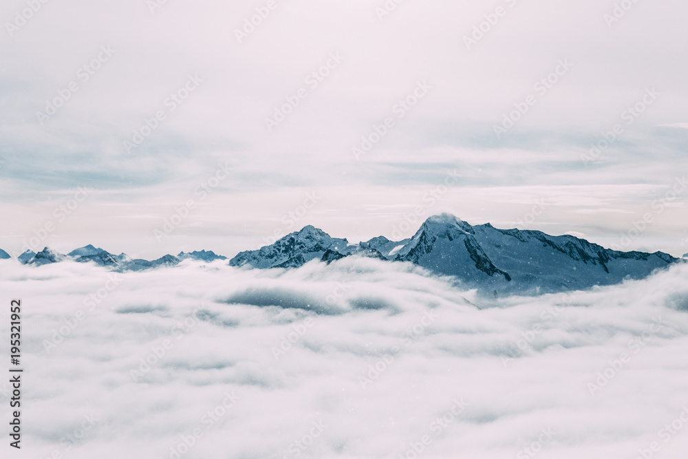 majestic snow-capped mountain peaks and clouds, mayrhofen, austria