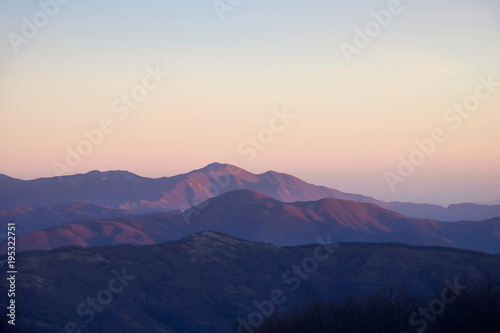 ridges of mountains in a beautiful winter sunset