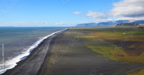 Sea coast near the Arch Dyrholaey in Iceland