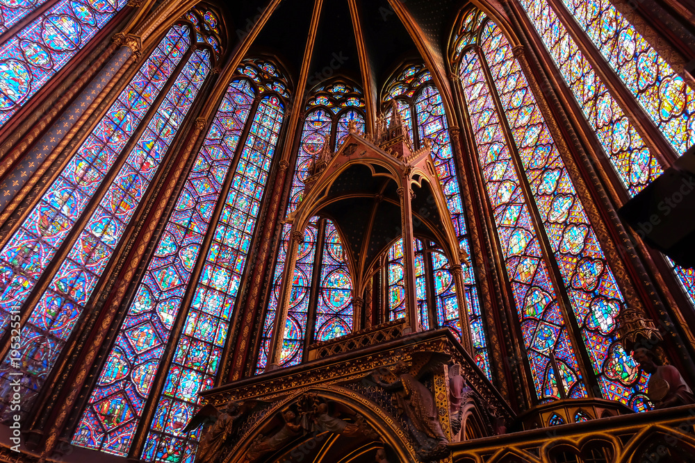 Obraz premium Interiors of the Sainte-Chapelle (Holy Chapel). The Sainte-Chapelle is a royal medieval Gothic chapel in Paris and one of the most famous monuments of the city